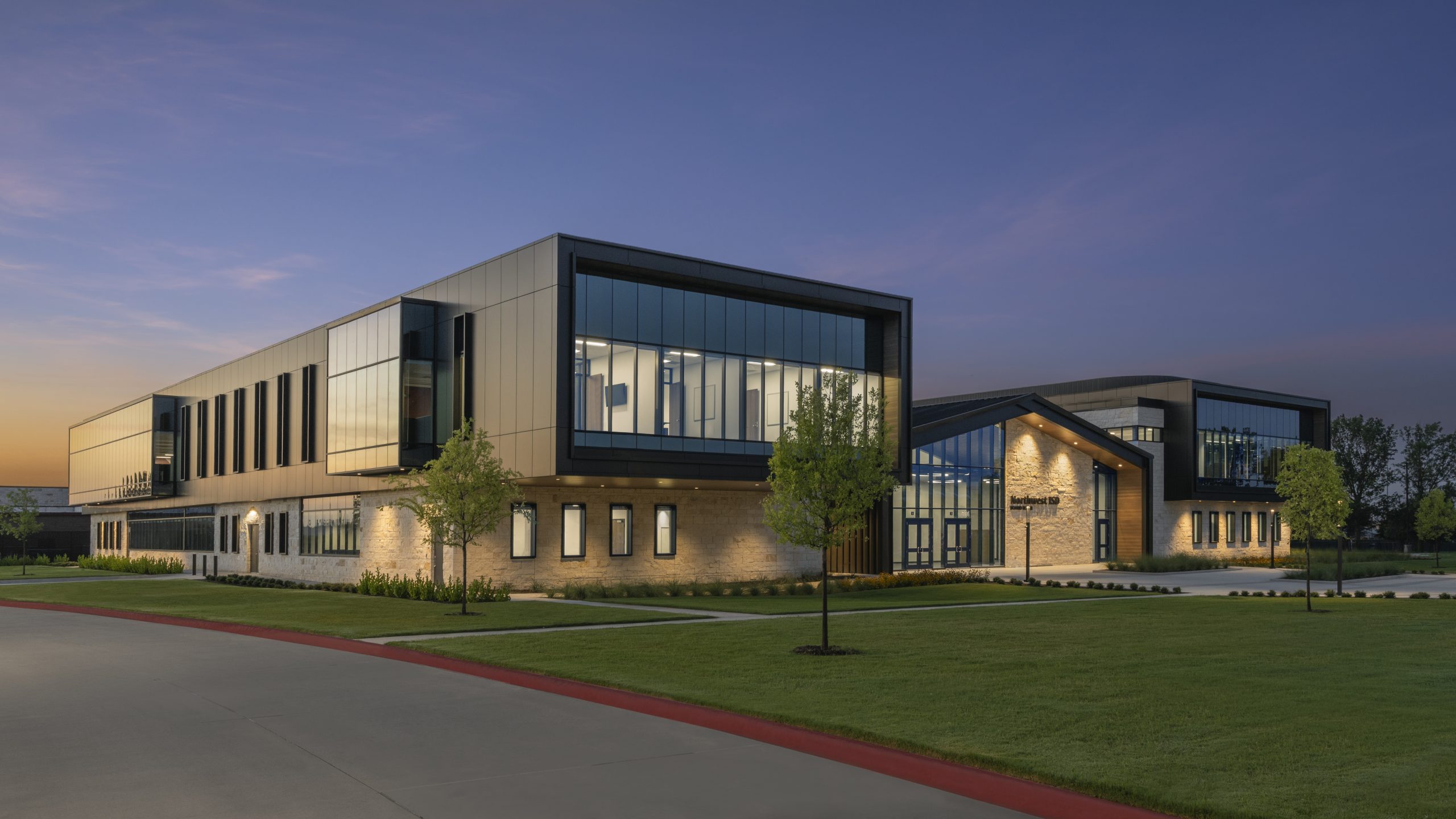 Modern DFW school campus exterior showing state-of-the-art facilities typical of Frisco and Plano ISDs